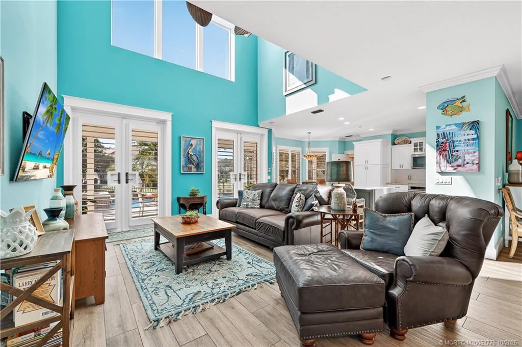 802 Southeast Portage Avenue Port St. Lucie, FL 34984 - Photo 14 of 48 a living room with furniture and a large window