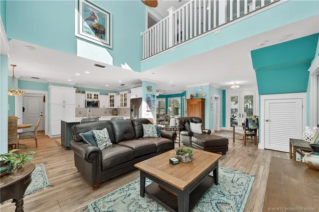 a living room with furniture and a rug