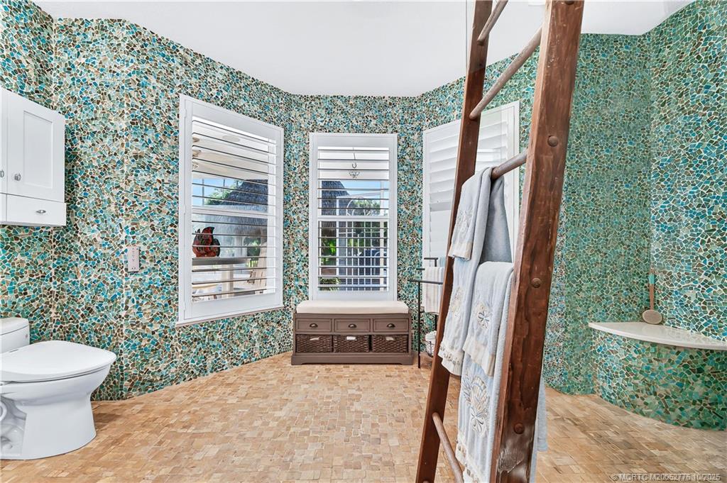 802 Southeast Portage Avenue Port St. Lucie, FL 34984 - Photo 26 of 48 a view of a back yard from a porch