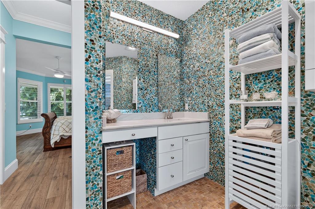 802 Southeast Portage Avenue Port St. Lucie, FL 34984 - Photo 27 of 48 a room with a desk and chair