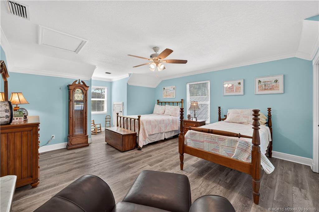 802 Southeast Portage Avenue Port St. Lucie, FL 34984 - Photo 33 of 48 a living room with furniture and wooden floor