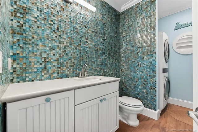 a room with musical instrument pool table and windows