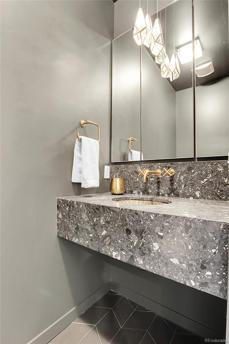 3131 Zuni Street, Unit 302 Denver, CO 80211 - Photo 17 of 36 a view of a granite counter top