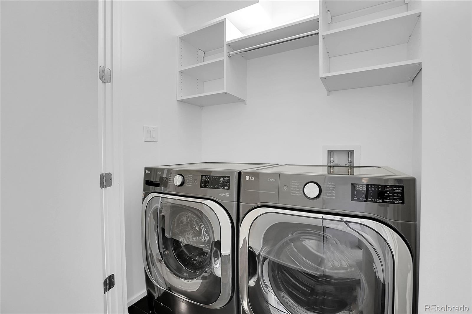3131 Zuni Street, Unit 302 Denver, CO 80211 - Photo 29 of 36 a utility room with dryer and washer