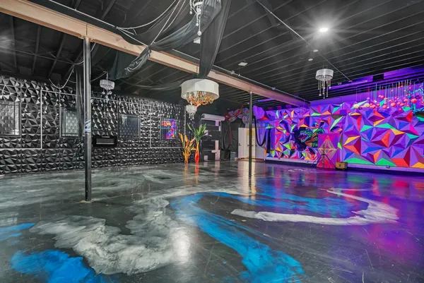 a view of a studio with a patio