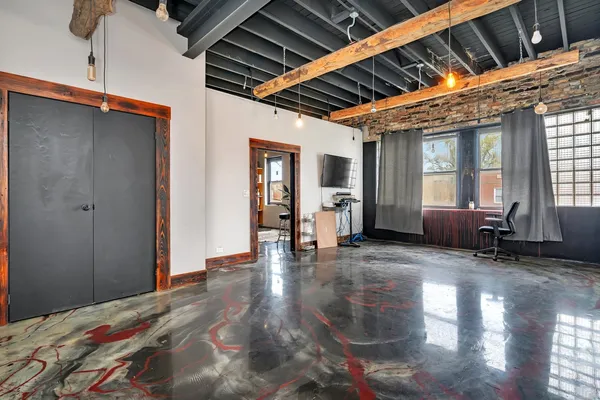 a view of living room with furniture and fireplace