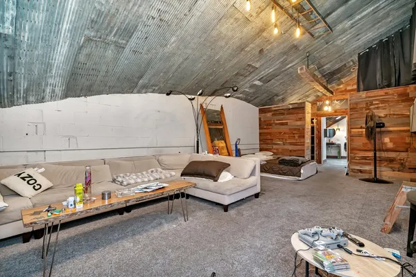 a view of a garage with sitting area