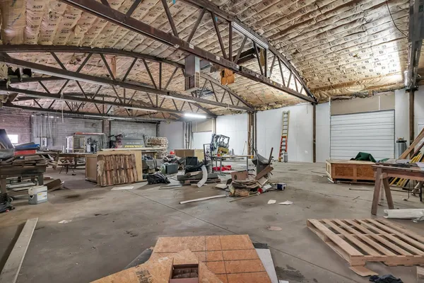 a view of a garage with wooden wall