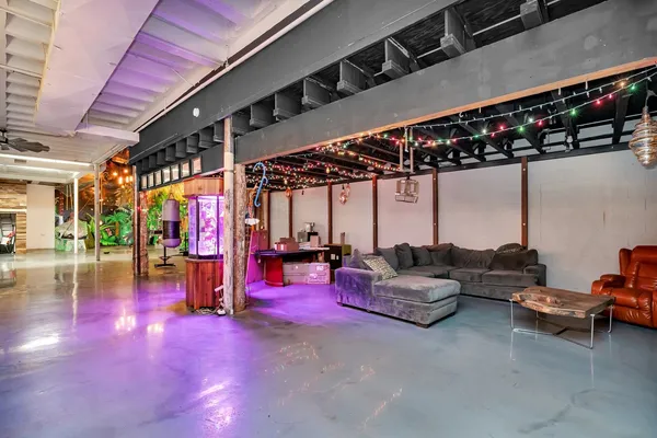 a living room with lots of furniture