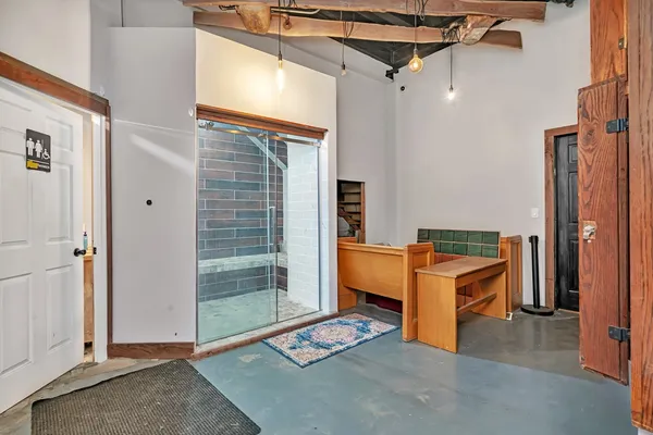a view of a hallway with workspace