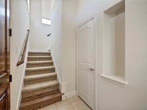 a view of an entryway with staircase