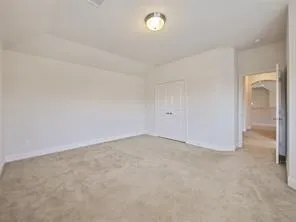 an empty room with a natural light