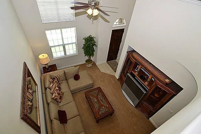 image of a living room with furniture and a window