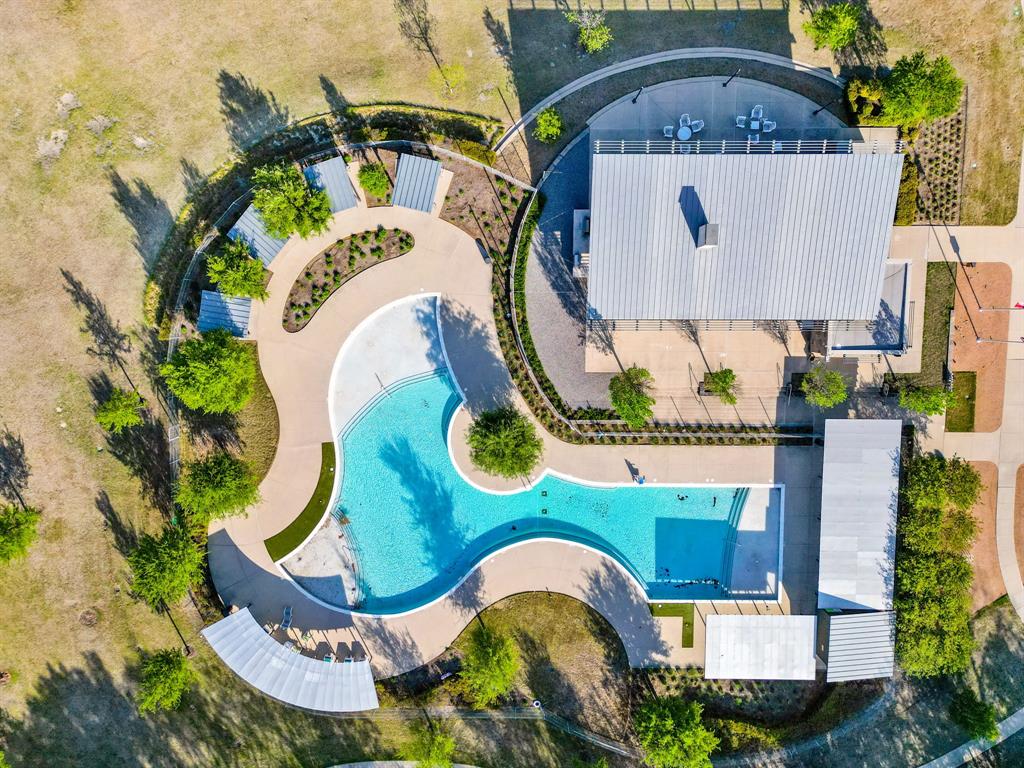 1501 Snowdrop Drive Prosper, TX 75078 - Photo 4 of 27 an aerial view of a house with a swimming pool