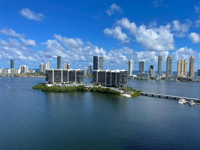 a view of a city with tall buildings
