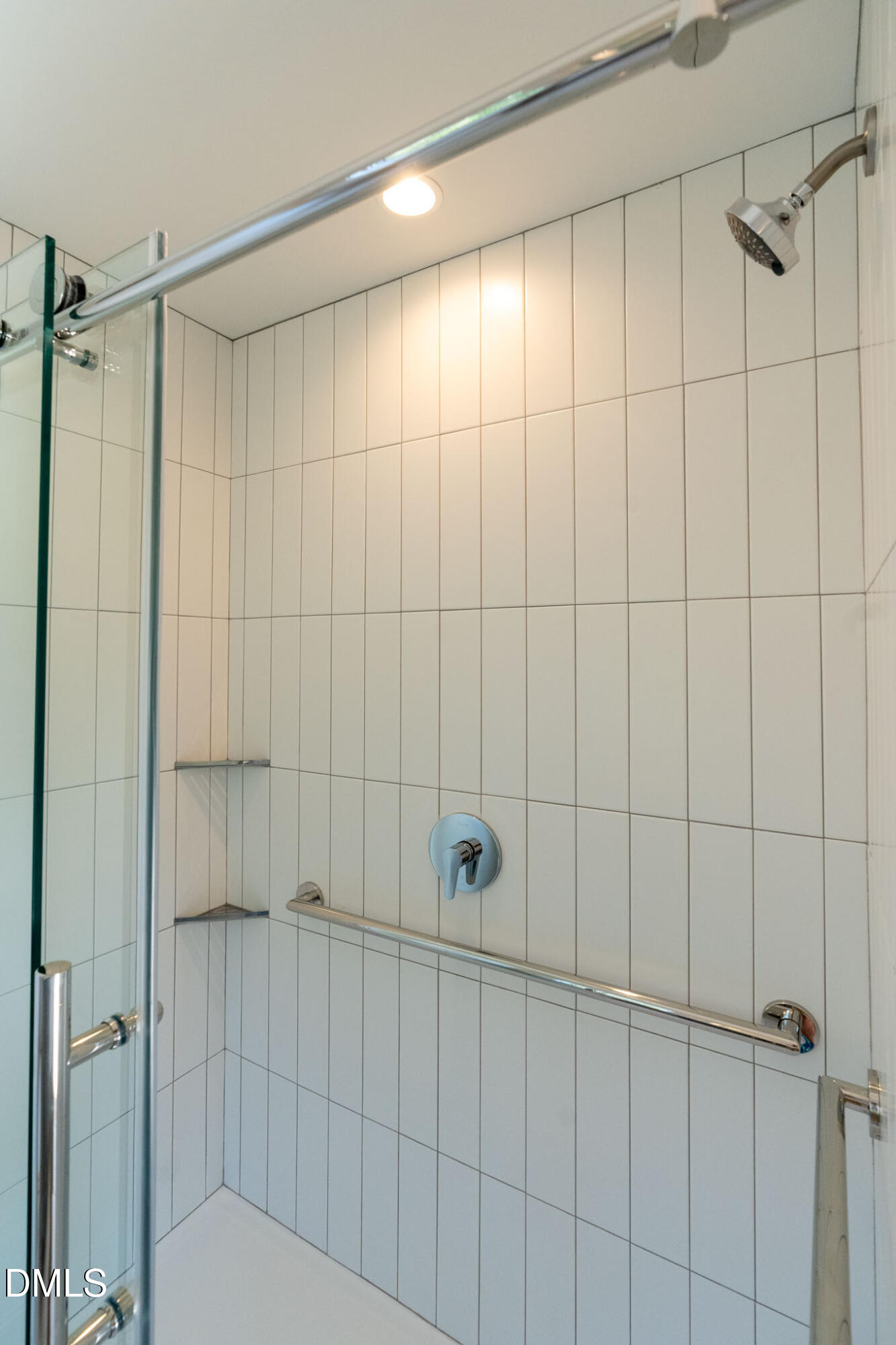 400 East Martin Street, Unit A Raleigh, NC 27601 - Photo 13 of 29 a bathroom with a shower toilet and sink