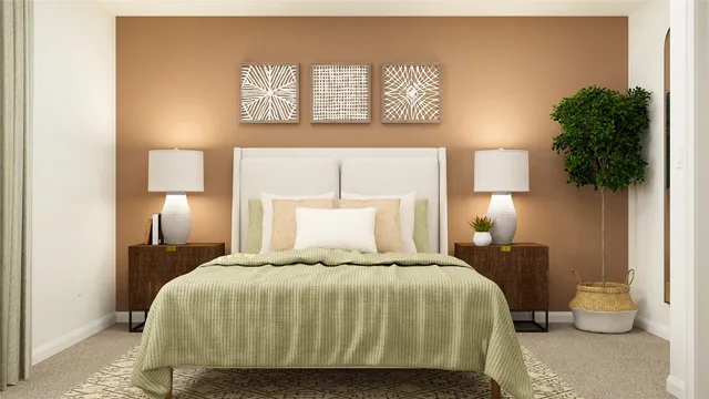 a bedroom with a bed and a potted plant