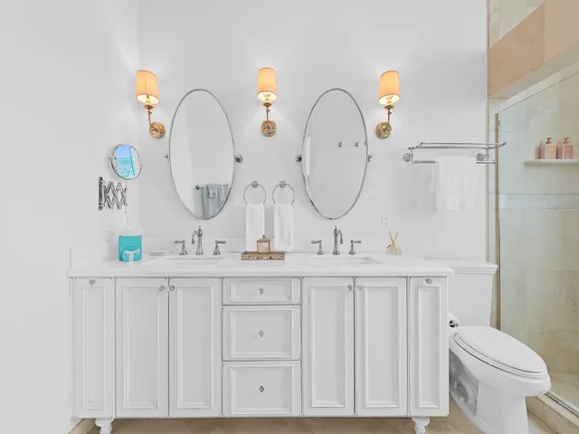 a bathroom with sink and mirror