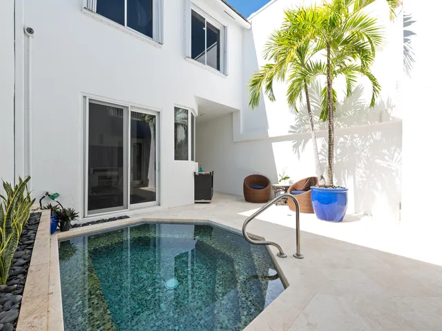 a house view with a swimming pool