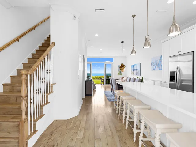 a view of a kitchen and dining room