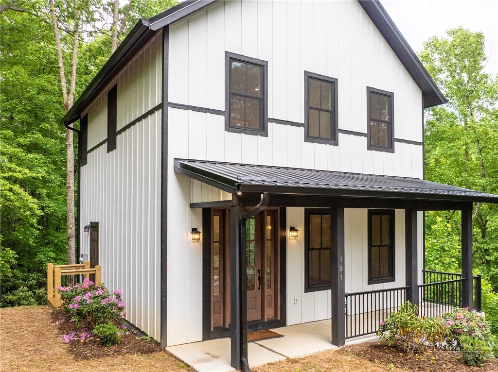131 Bryce Way Boone, NC 28607 - Photo 5 of 38 a front view of a house with a porch