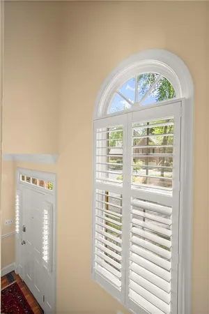 a view of front door with wooden floor