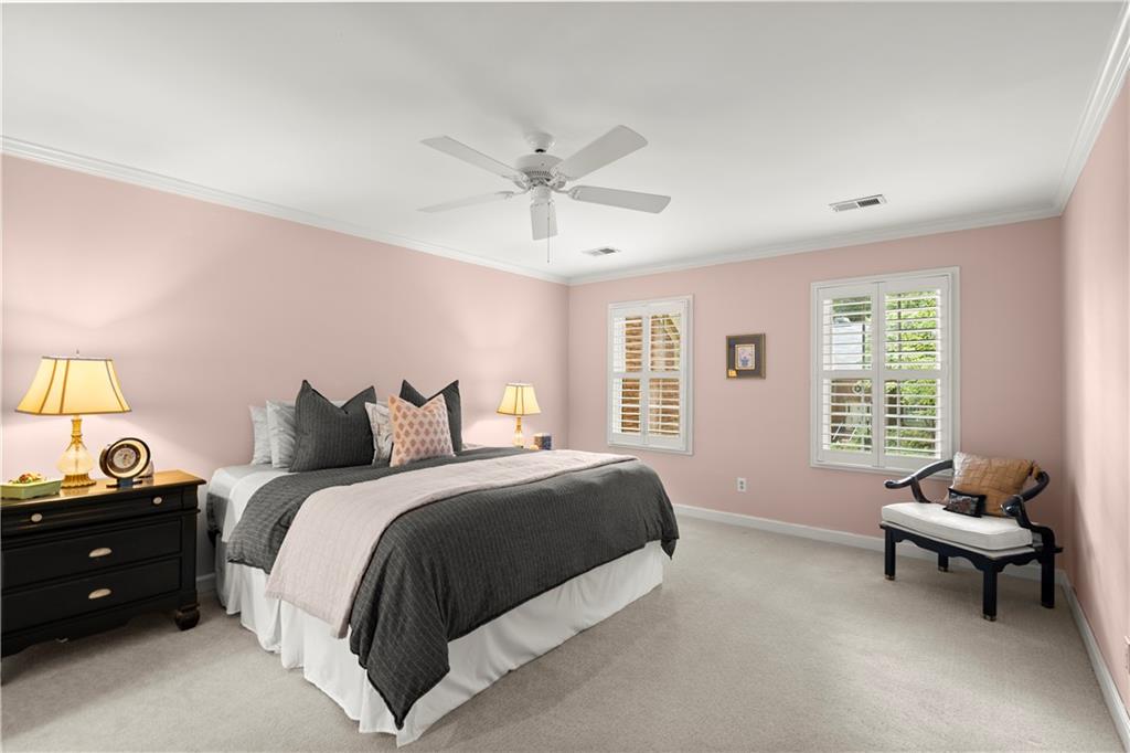 40 Ivy Chase Northeast Atlanta, GA 30342 - Photo 21 of 39 a spacious bedroom with a bed and a window