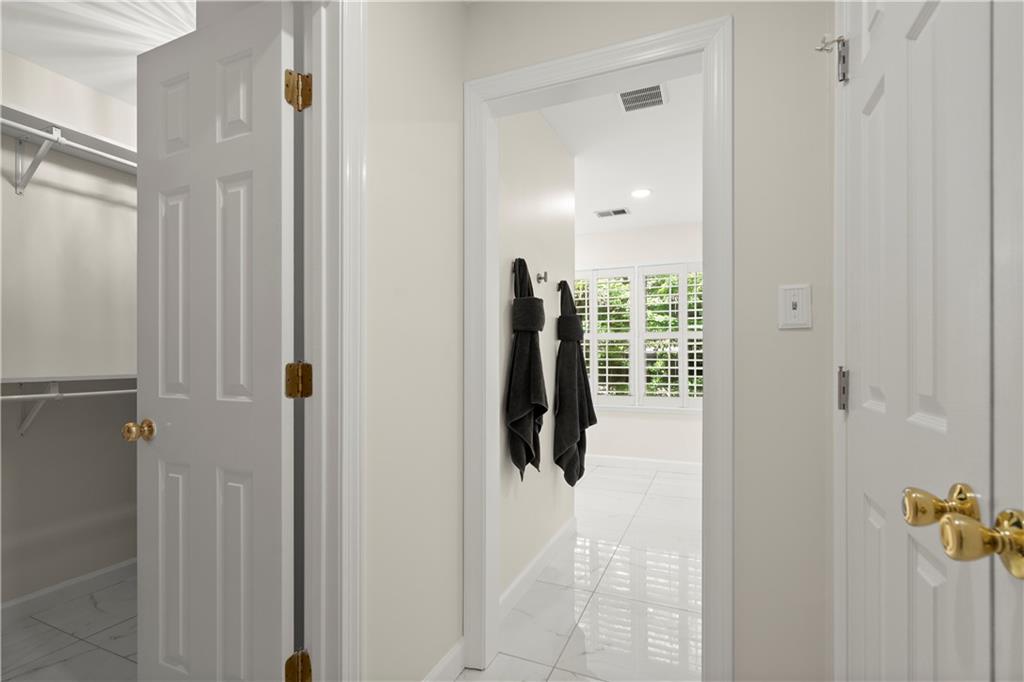 40 Ivy Chase Northeast Atlanta, GA 30342 - Photo 22 of 39 a close view of walk in closet and bathroom