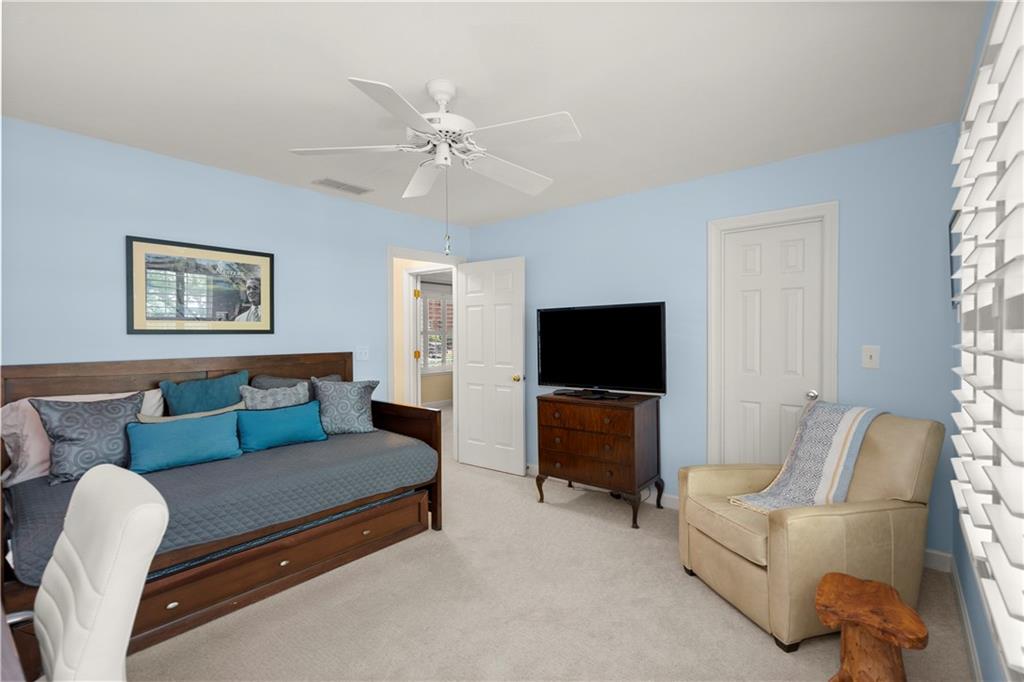 40 Ivy Chase Northeast Atlanta, GA 30342 - Photo 28 of 38 a living room with furniture and a flat screen tv