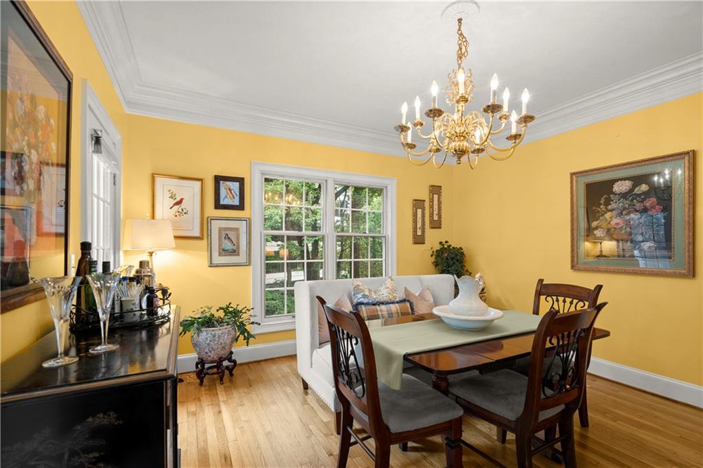 40 Ivy Chase Northeast Atlanta, GA 30342 - Photo 6 of 38 a view of a dining room with furniture window and outside view