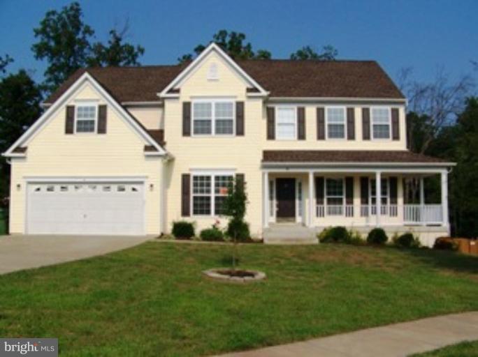 4 Gallery Road Stafford, VA 22554 - Photo 1 of 21 a front view of a house with a yard
