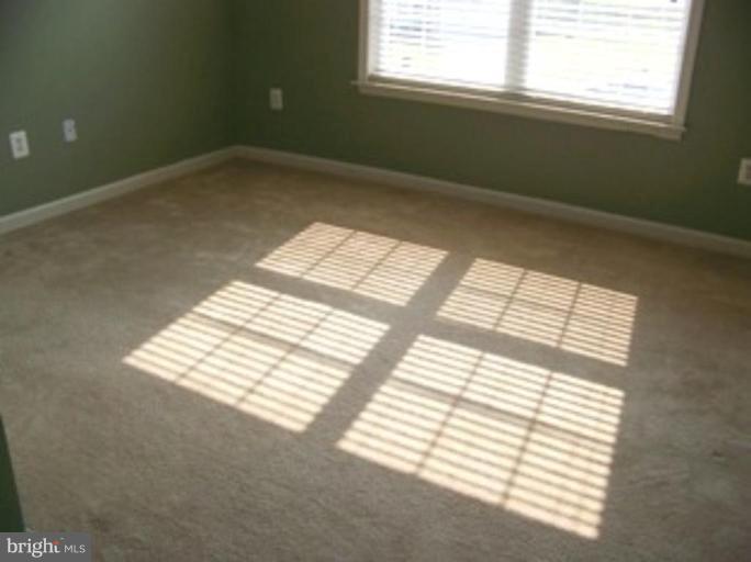 4 Gallery Road Stafford, VA 22554 - Photo 12 of 21 a view of an empty room and a window