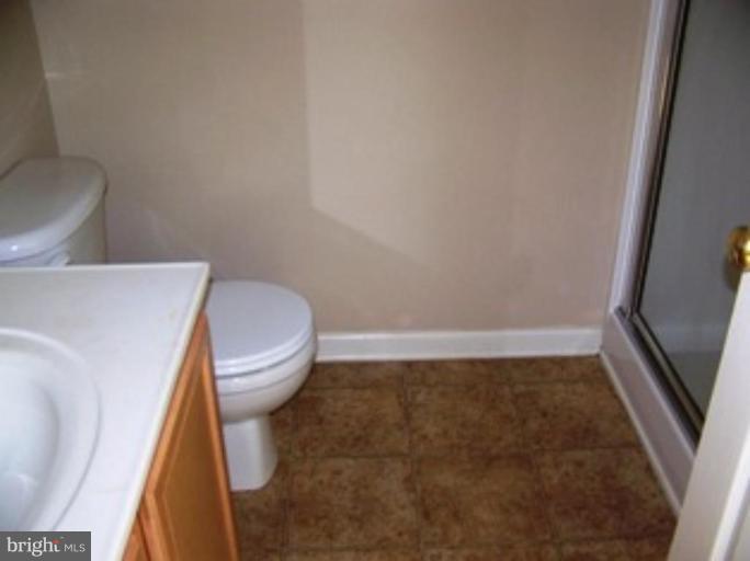 4 Gallery Road Stafford, VA 22554 - Photo 14 of 21 a bathroom with a toilet and a sink