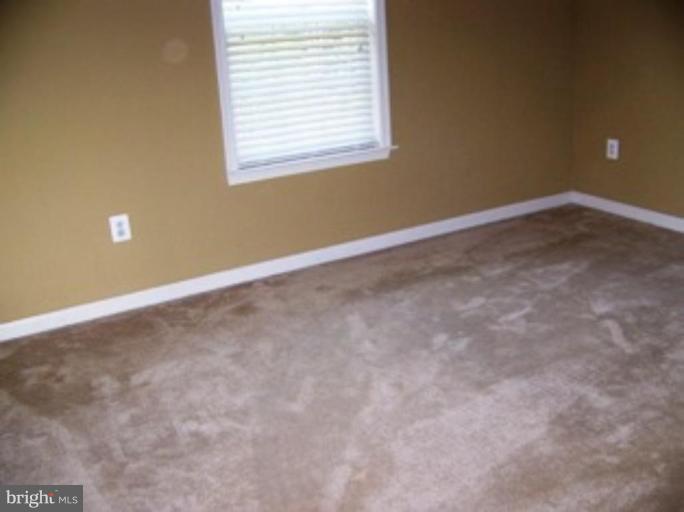 4 Gallery Road Stafford, VA 22554 - Photo 16 of 21 an empty room with a window