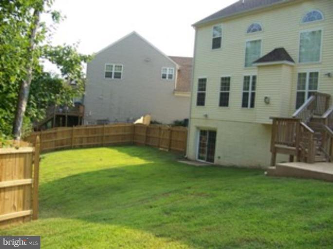 4 Gallery Road Stafford, VA 22554 - Photo 19 of 21 a view of a house with a backyard