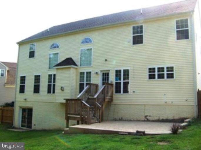 4 Gallery Road Stafford, VA 22554 - Photo 21 of 21 a view of a house with backyard