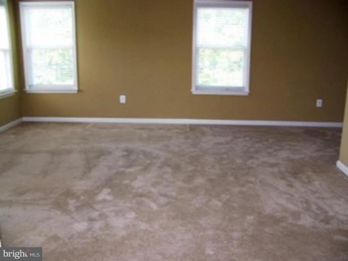 4 Gallery Road Stafford, VA 22554 - Photo 9 of 21 a view of an empty room with a window