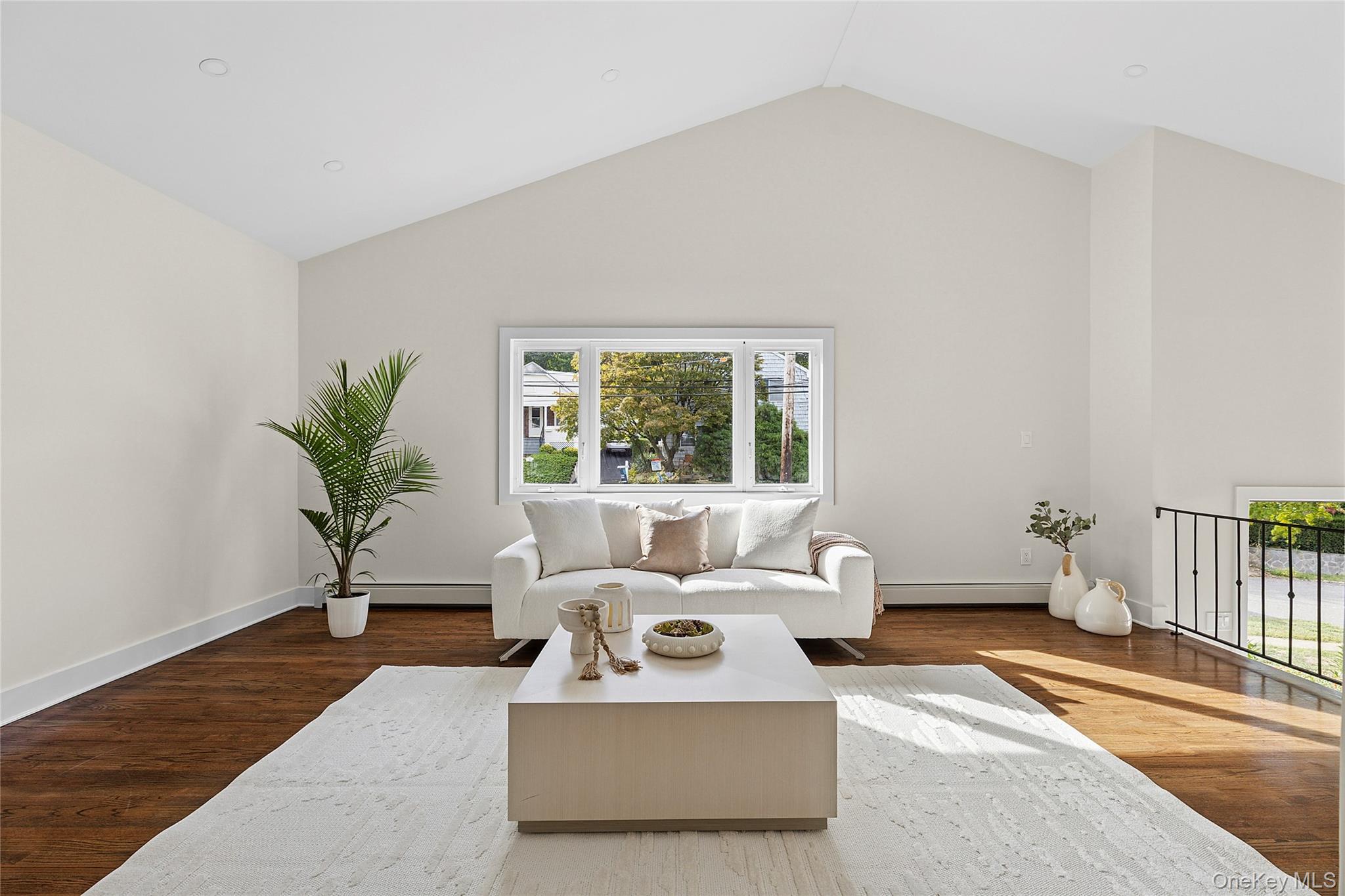 21 A Neulist Avenue Port Washington, NY 11050 - Photo 3 of 17 a living room with furniture and a window