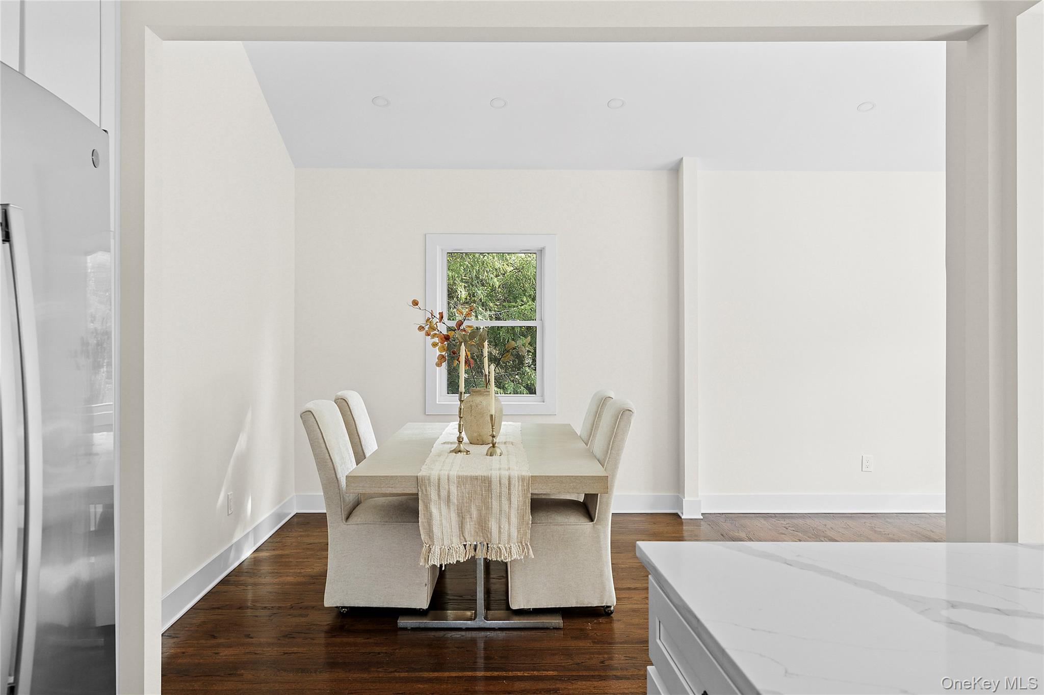 21 A Neulist Avenue Port Washington, NY 11050 - Photo 5 of 17 a living room with furniture and a window