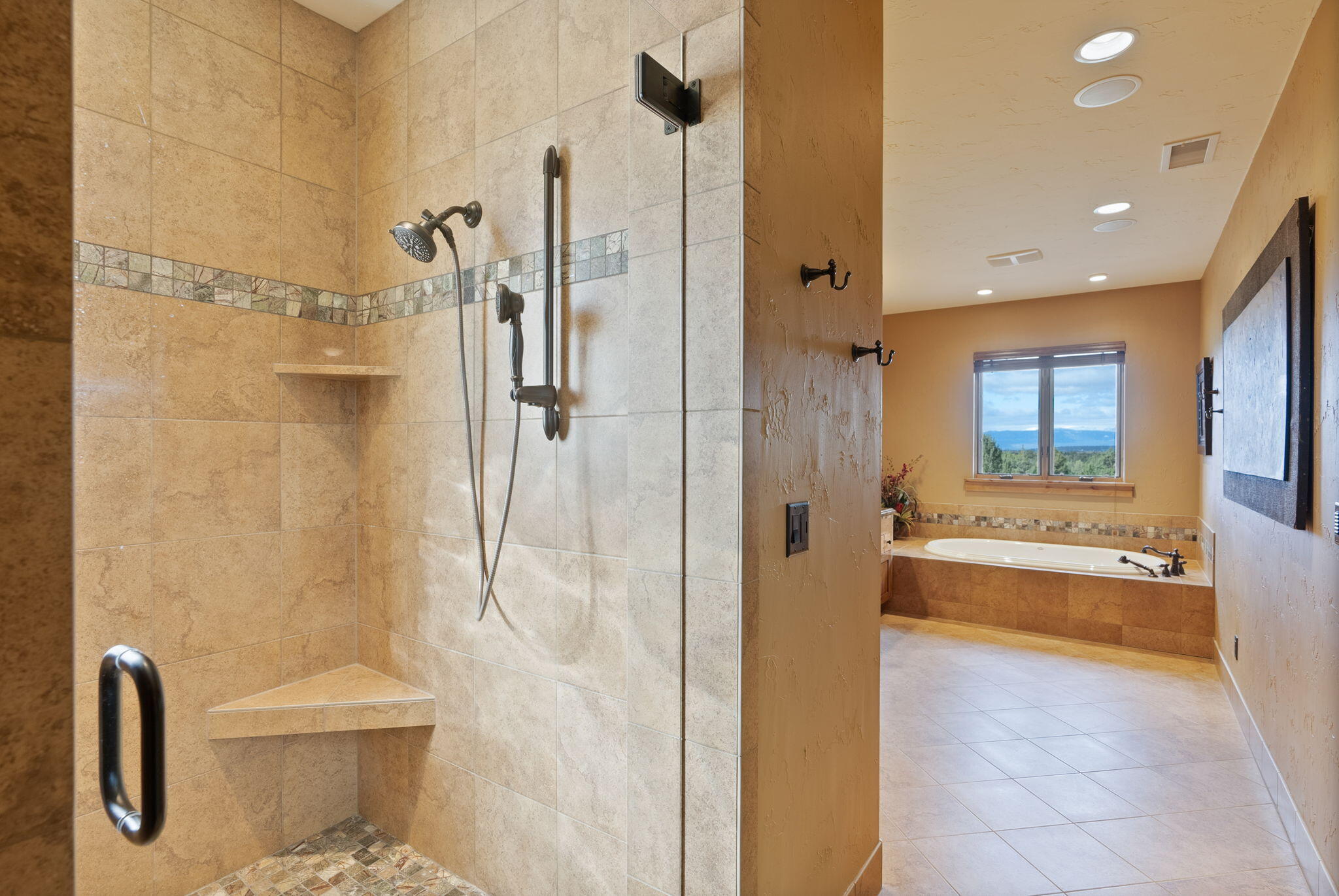 22887 Ghost Tree Lane Bend, OR 97701 - Photo 50 of 97 Fully tiled walk-in shower with custom glass door and multipe shower heads