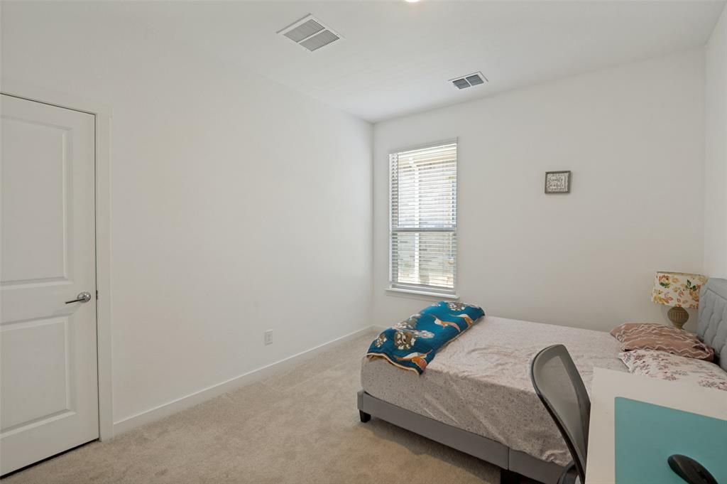 536 Breeds Hl Road Little Elm, TX 75068 - Photo 10 of 13 Bedroom with attached full bath