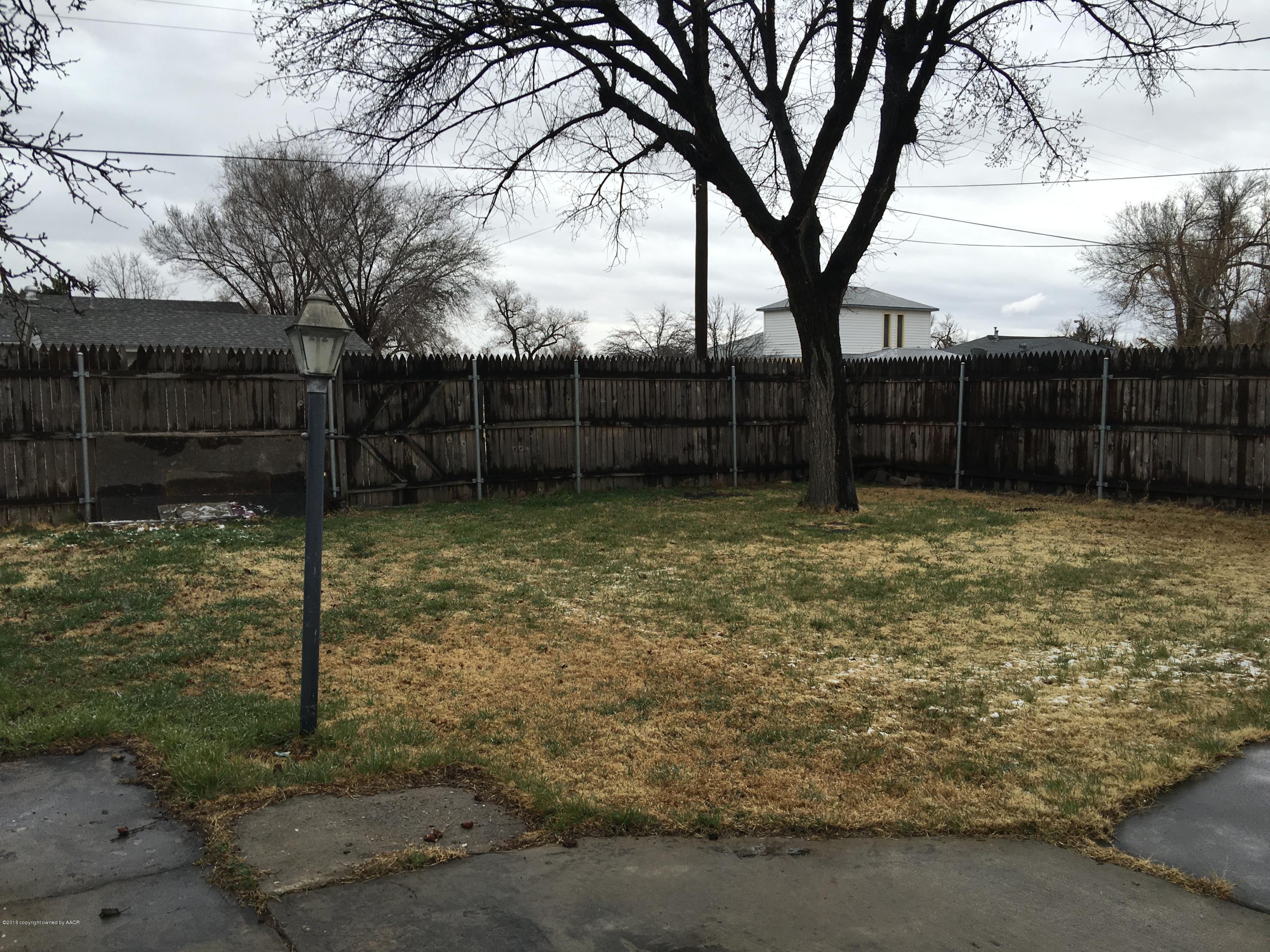 4321 South Travis Street Amarillo, TX 79110 - Photo 23 of 38 a view of a backyard