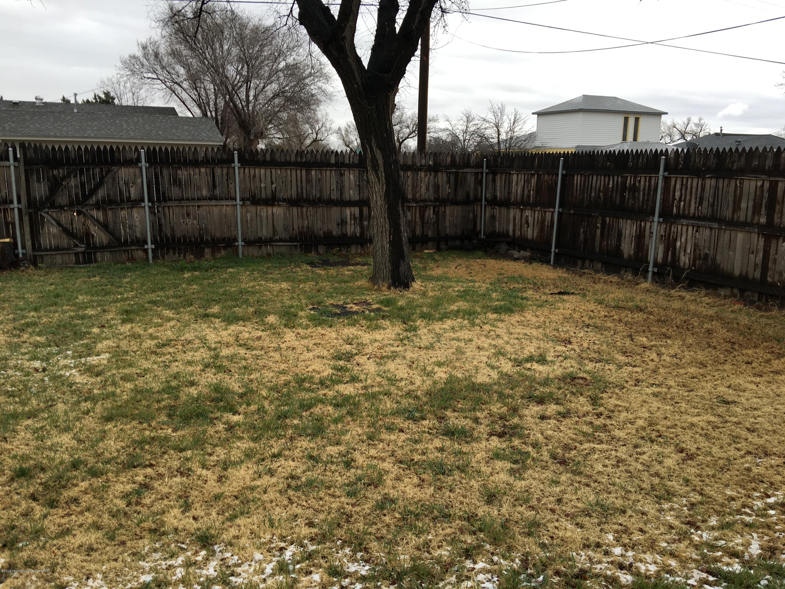 4321 South Travis Street Amarillo, TX 79110 - Photo 28 of 38 a view of a backyard
