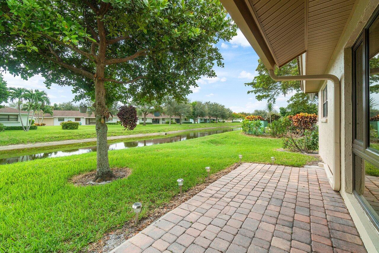 4435 Pandanus Tree Road, Unit B Boynton Beach, FL 33436 - Photo 23 of 47 Back Patio