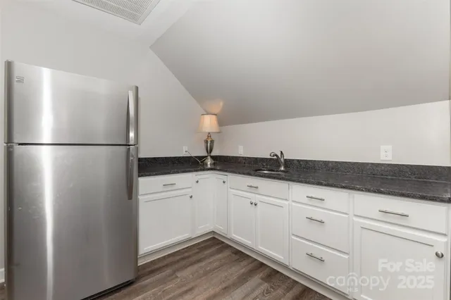 a view of a livingroom with a flat screen tv