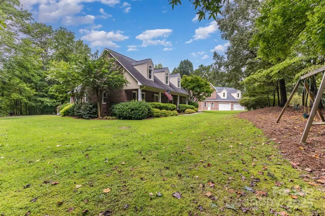a outdoor living space with furniture and garden view
