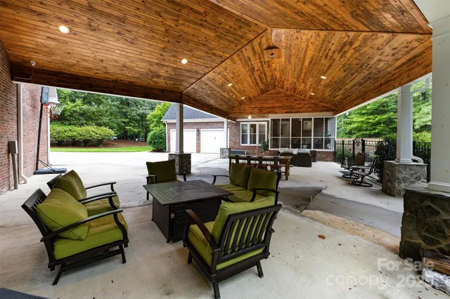 a view of a swimming pool with an outdoor space