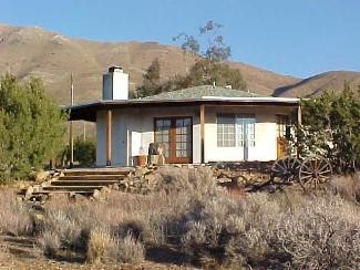 20522 Juniper Road Apple Valley, CA 92308 - Photo 1 of 1 a front view of a house with a yard