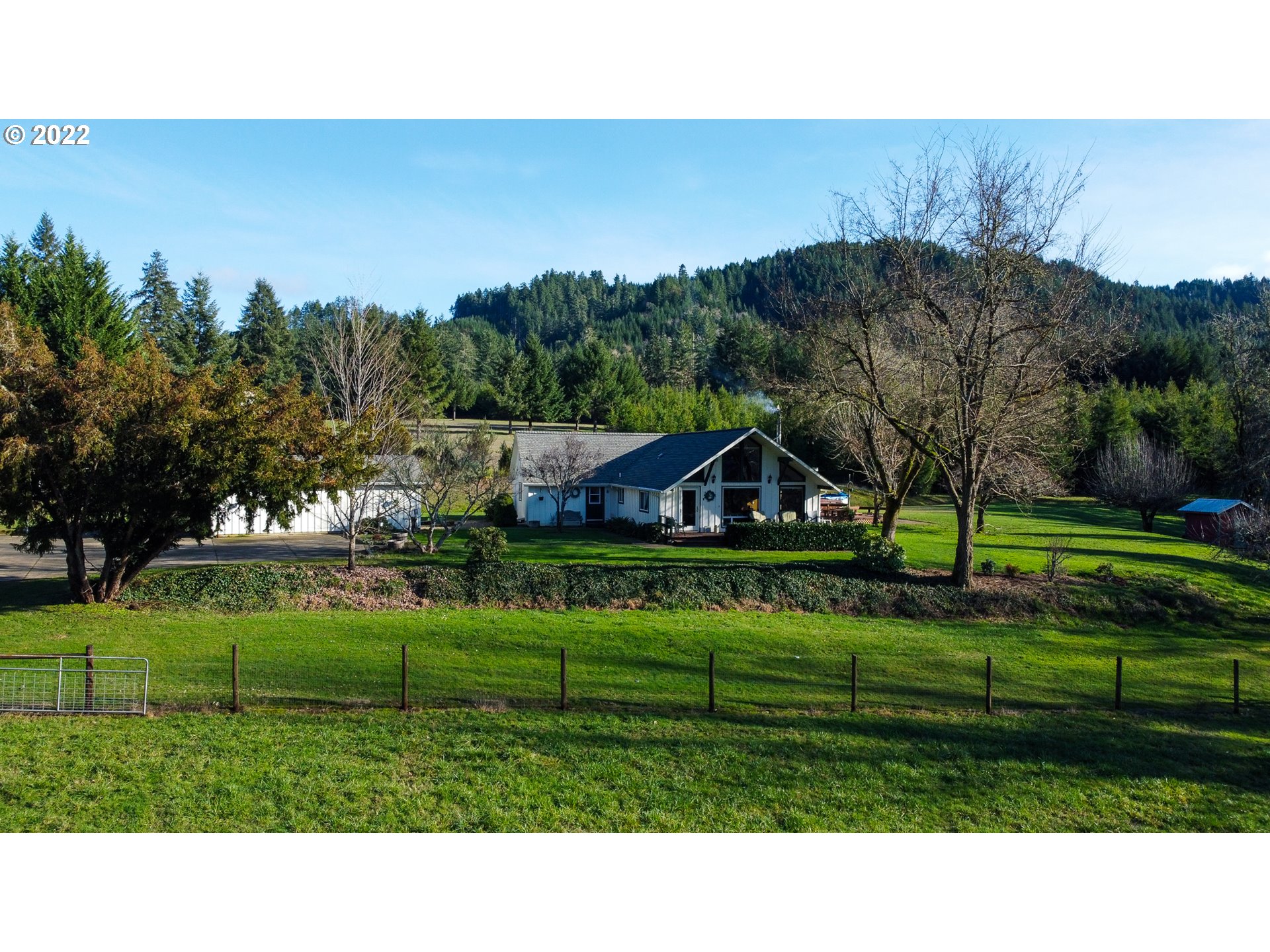 5064 Henderer Road Elkton, OR 97436 - Photo 1 of 32 a picture of a garden