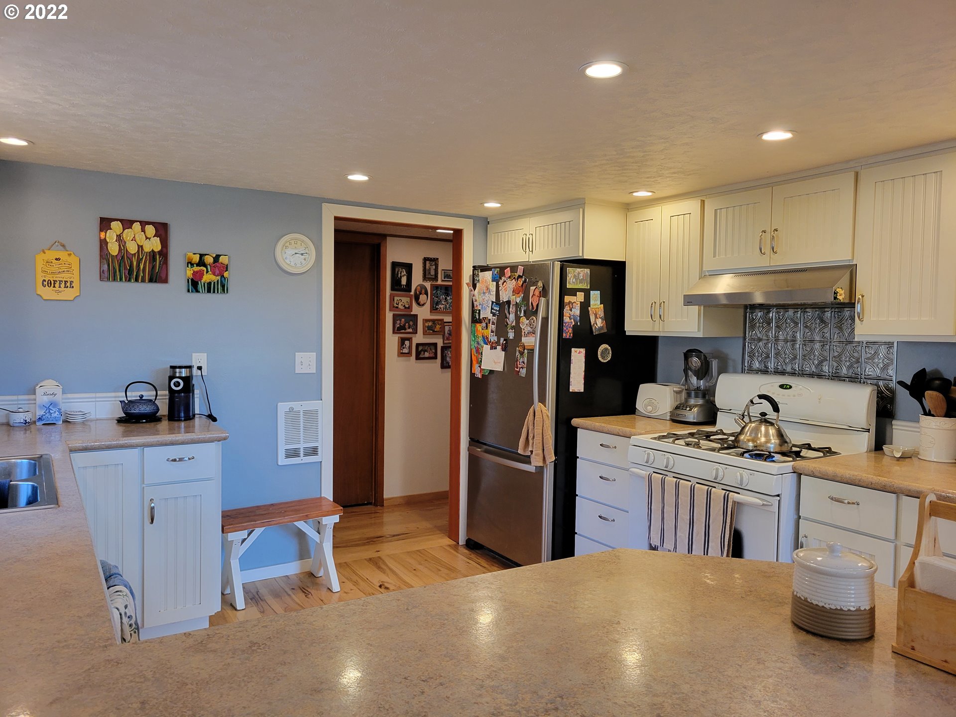 5064 Henderer Road Elkton, OR 97436 - Photo 3 of 32 a kitchen with stainless steel appliances granite countertop a refrigerator and a stove top oven
